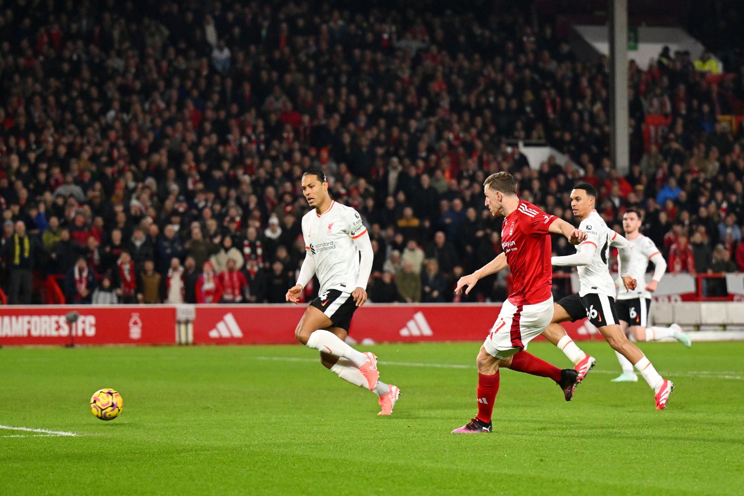 Chris Wood scores against Liverpool