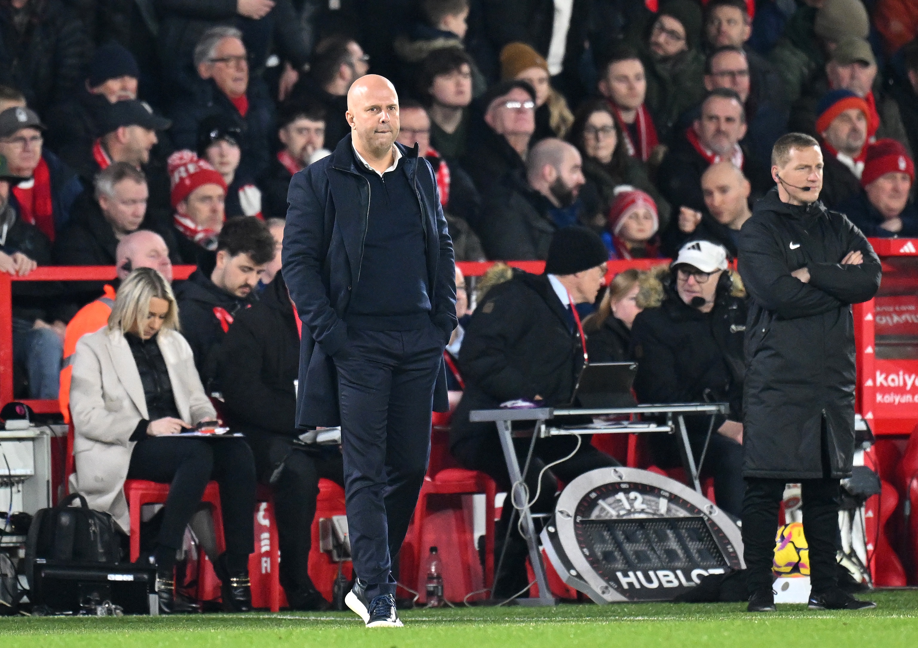 Arne Slot looks disappointed on the touchline at the City Ground.