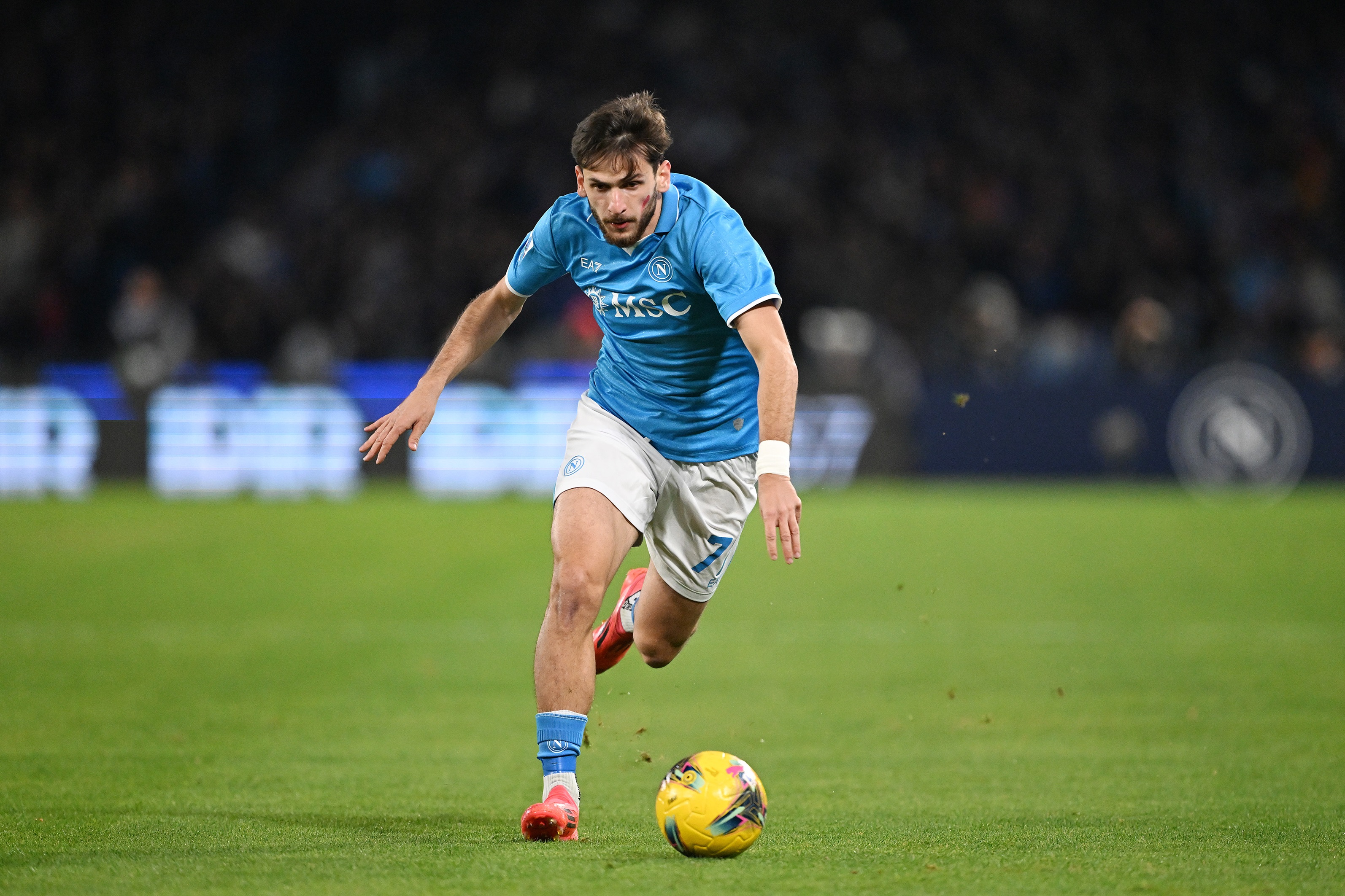 Khvicha Kvaratskhelia dribbles with the ball for Napoli.