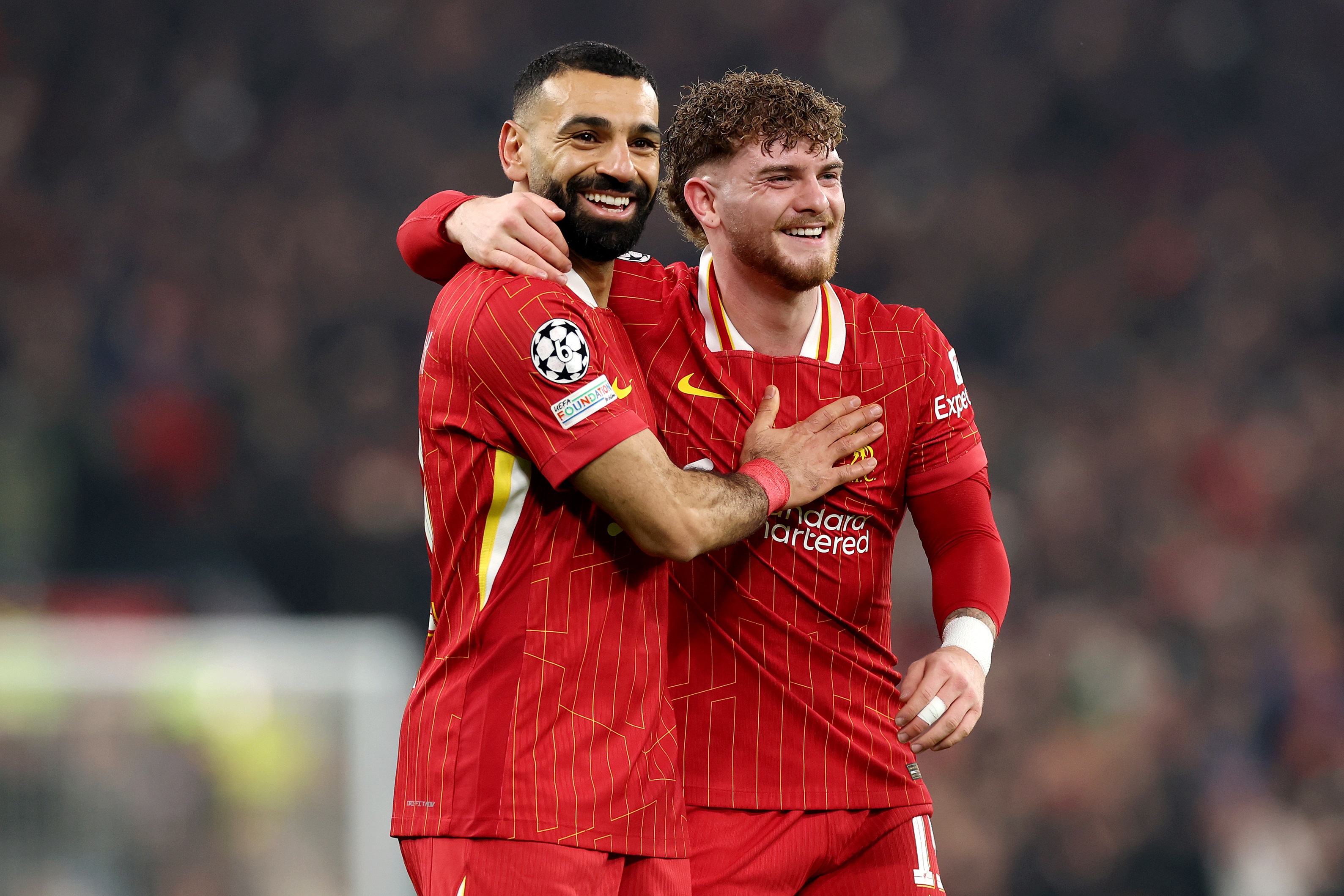 Mo Salah celebrates with Harvey Elliott at Anfield.