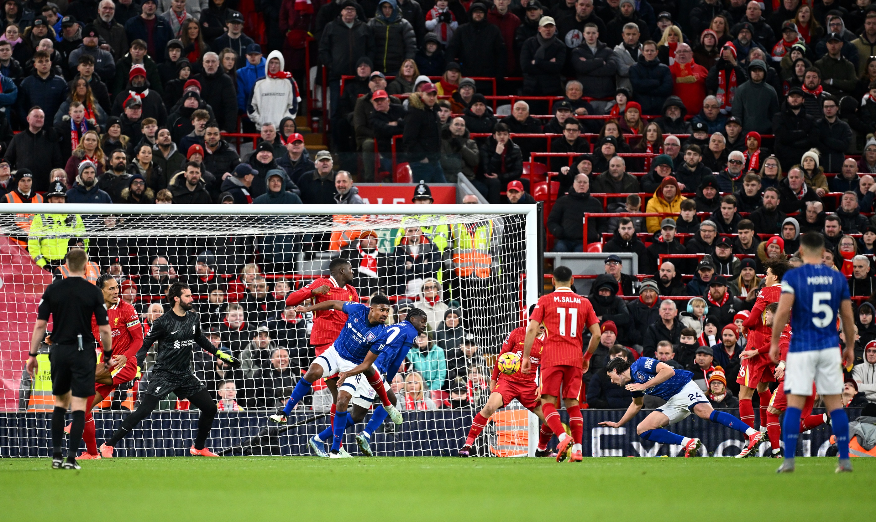 Jacob Greaves scores with a header against Liverpool.