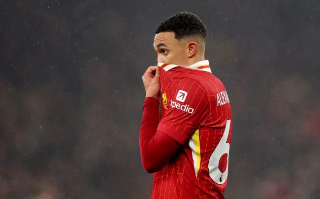 Trent Alexander-Arnold pulls his shirt over his face at Anfield.
