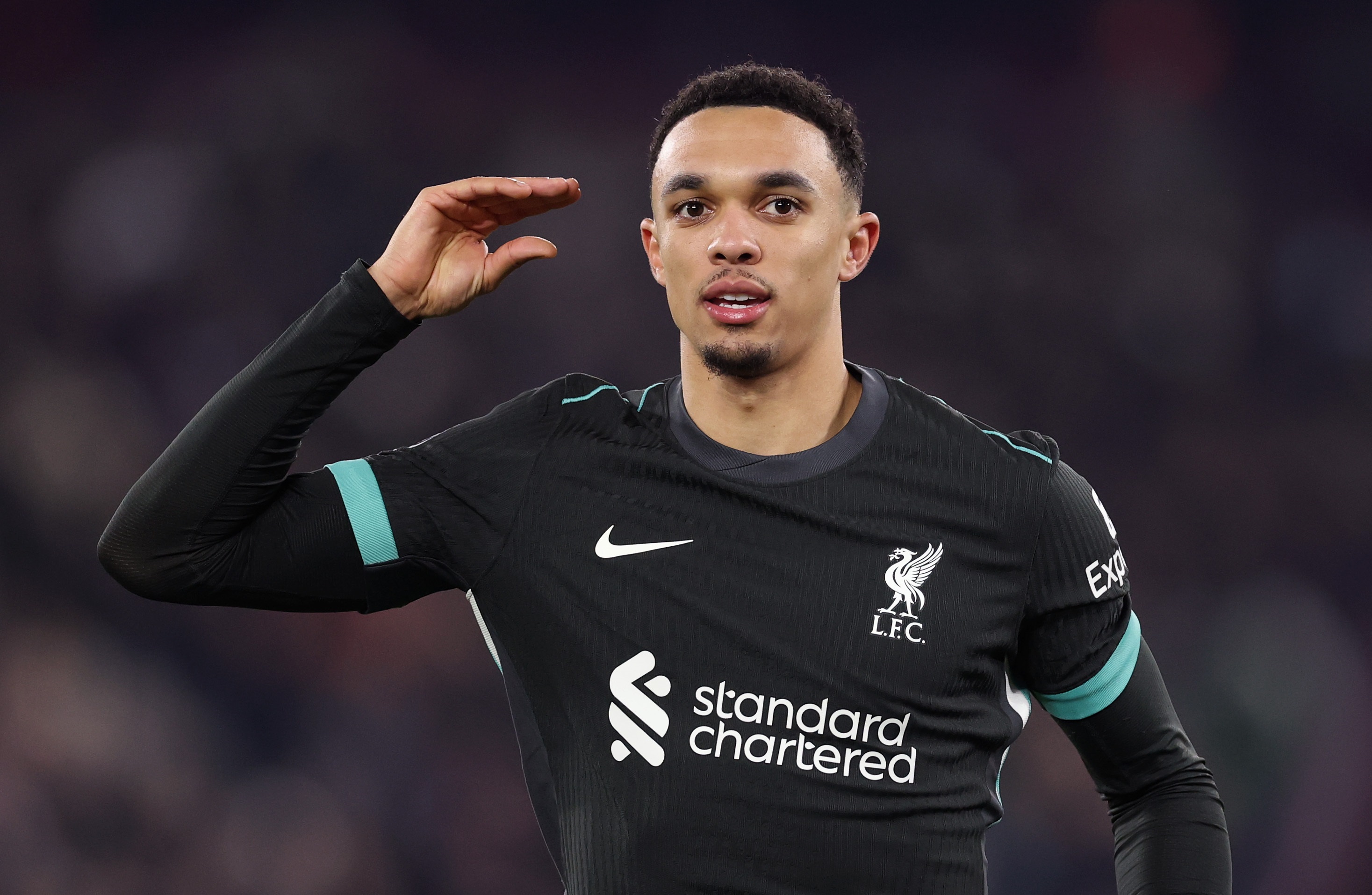 Trent Alexander-Arnold makes hand gesture during Liverpool v West Ham.