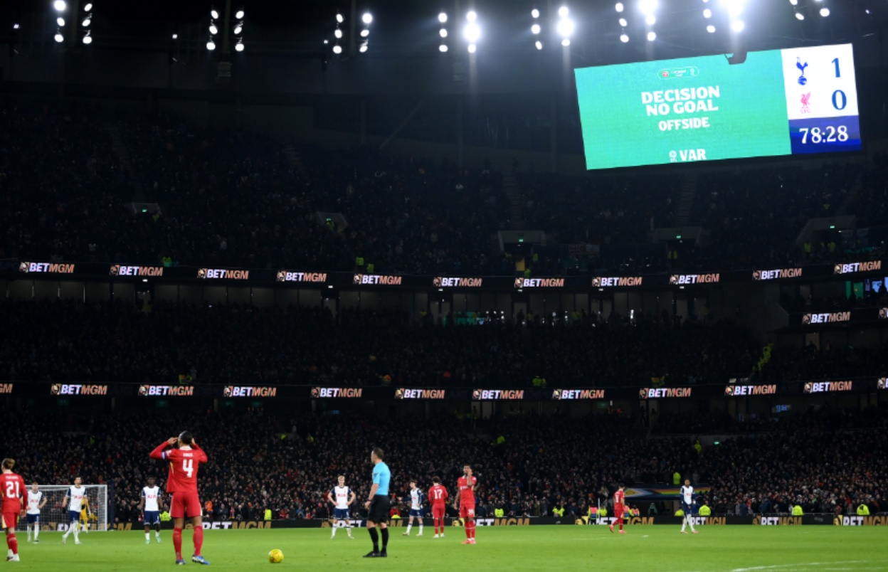 Stuart Attwell announces to fans in the stadium why Dominic Solanke's goal against Liverpool was disallowed