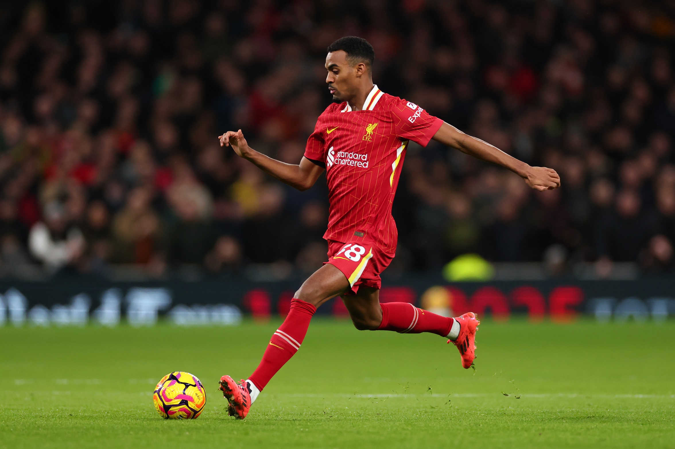 Ryan Gravenberch plays the ball during a Premier League match between Liverpool and Tottenham.