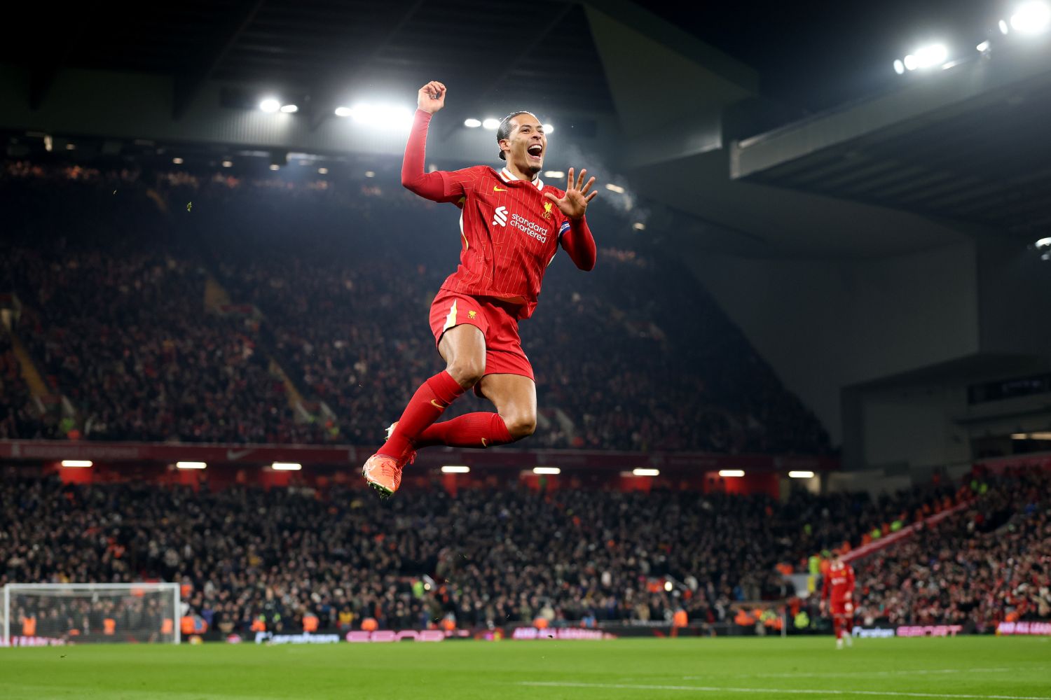 Virgil van Dijk celebrates scoring against Tottenham