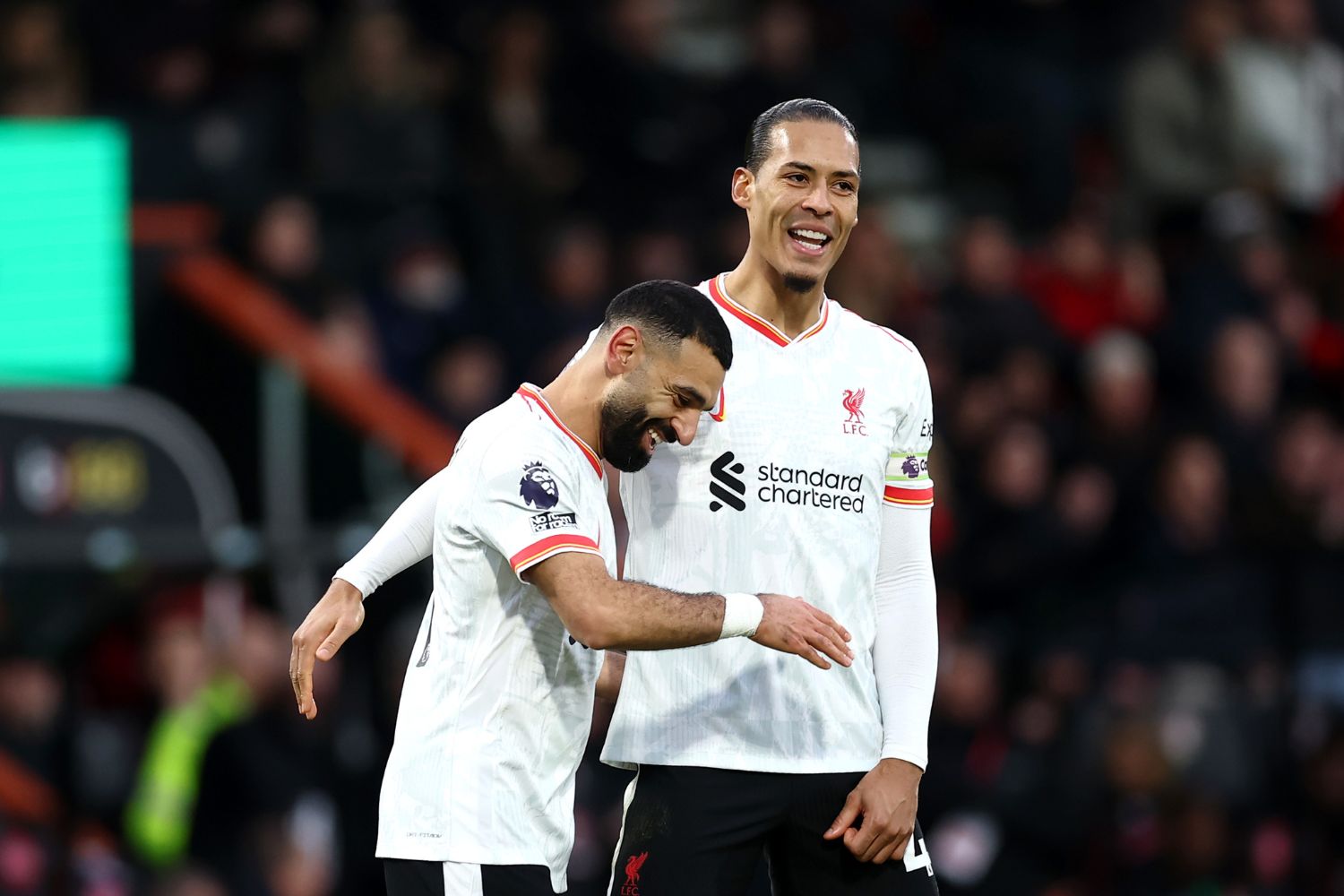 Mo Salah and Virgil van Dijk celebrate against Bournemouth