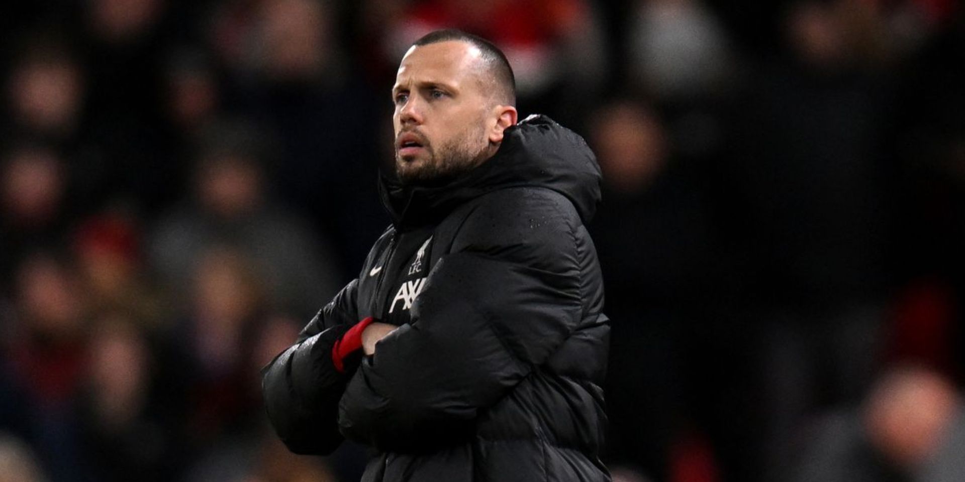 Johnny Heitinga oversees Liverpool at Anfield