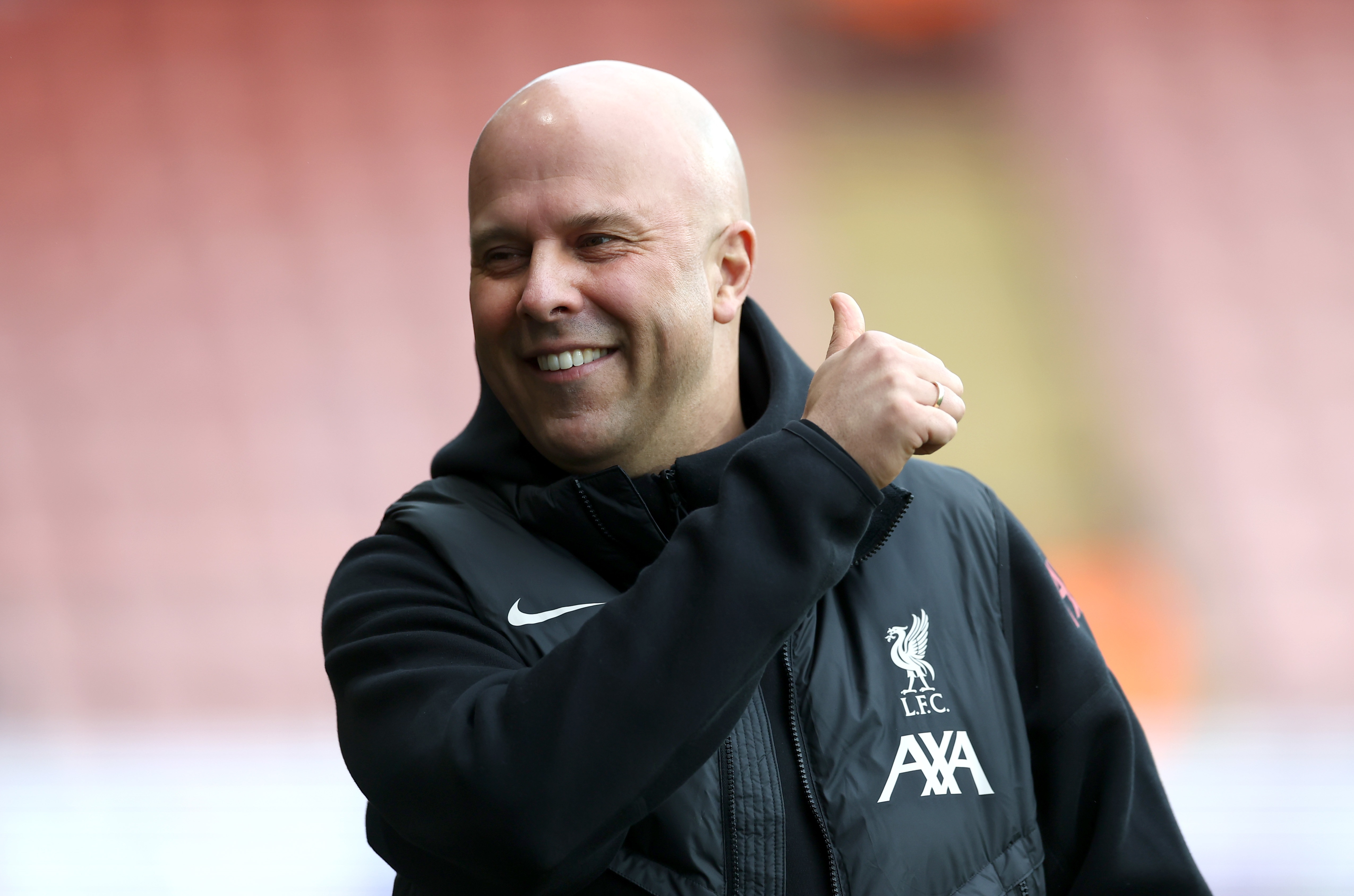 Arne Slot issues a thumbs-up sign ahead of Liverpool v Bournemouth.