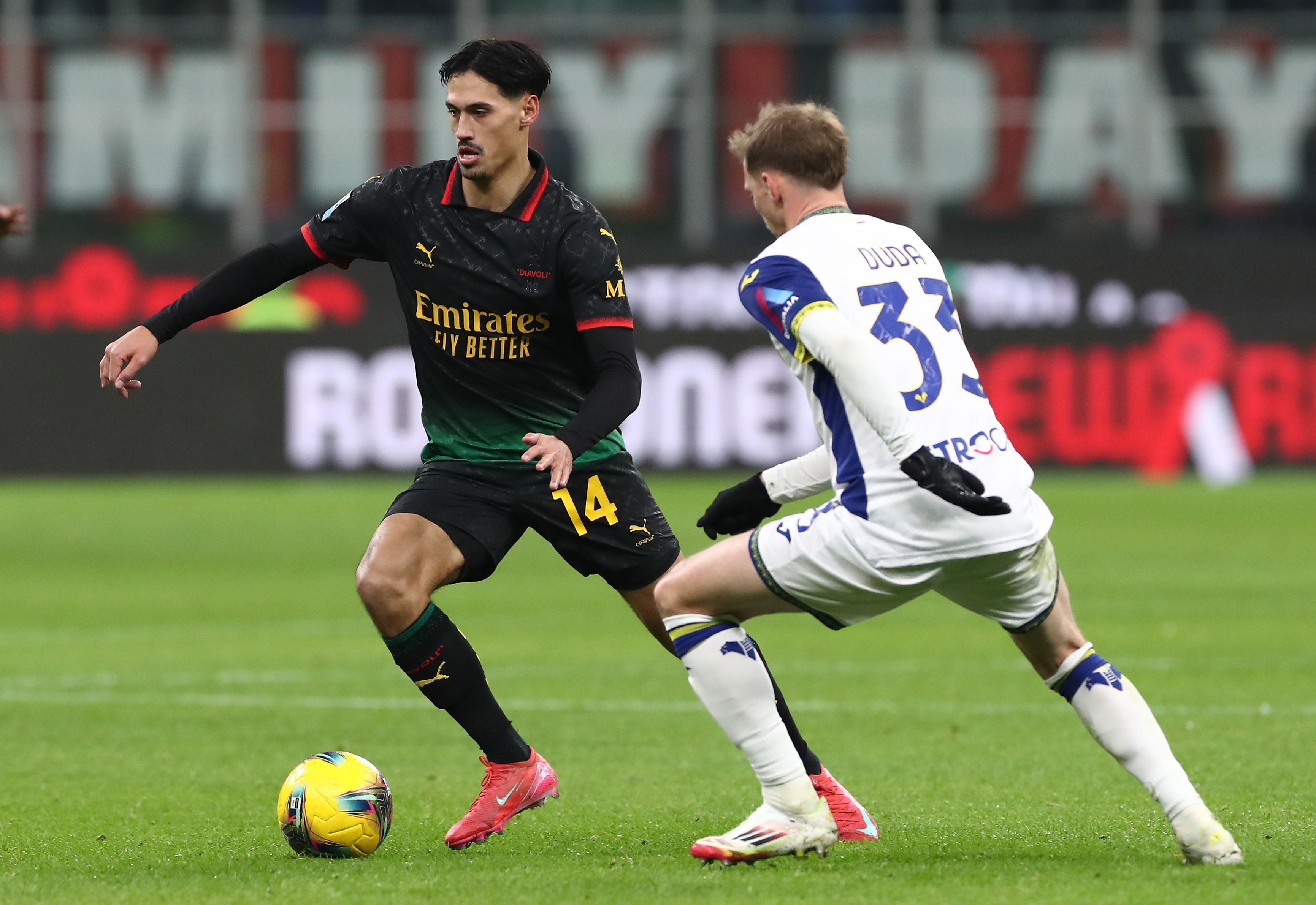 Tijjani Reijnders dribbles with the ball for AC Milan.