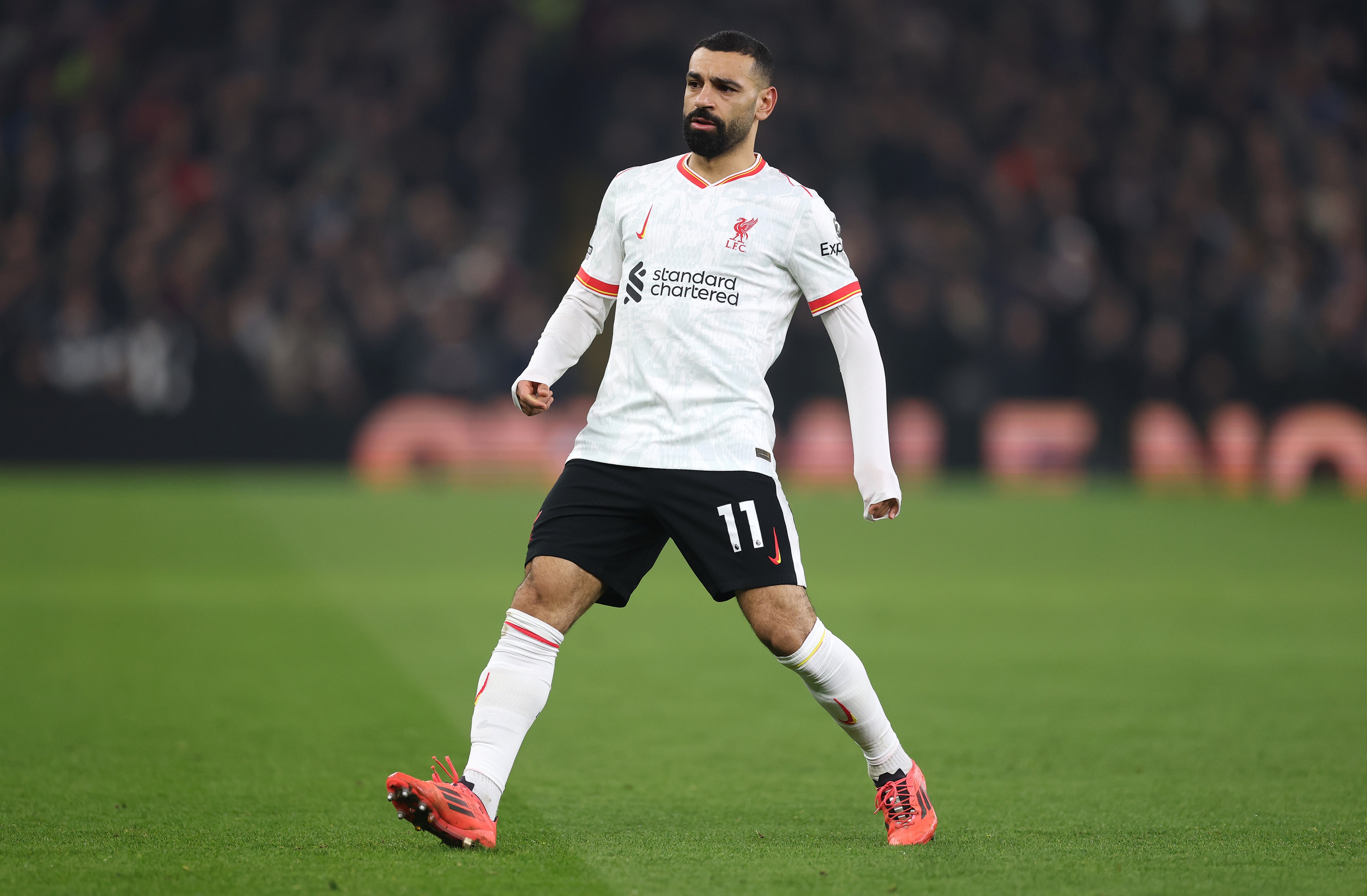 Mo Salah runs during Liverpool v Aston Villa at Villa Park.