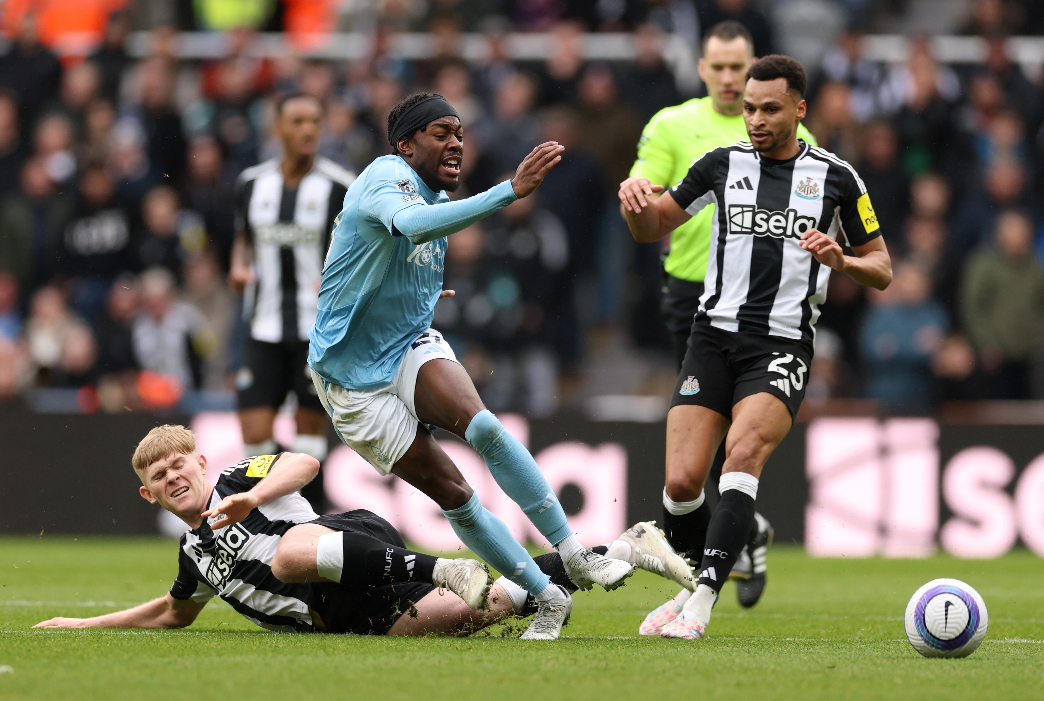 Liverpool target Lewis Hall tackles Anthony Elanga during Newcastle game.