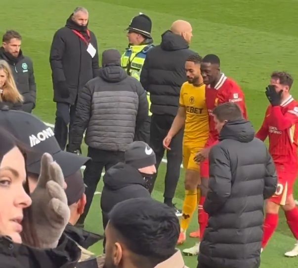 Matheus Cunha and Ibrahima Konate walk down Liverpool tunnel.