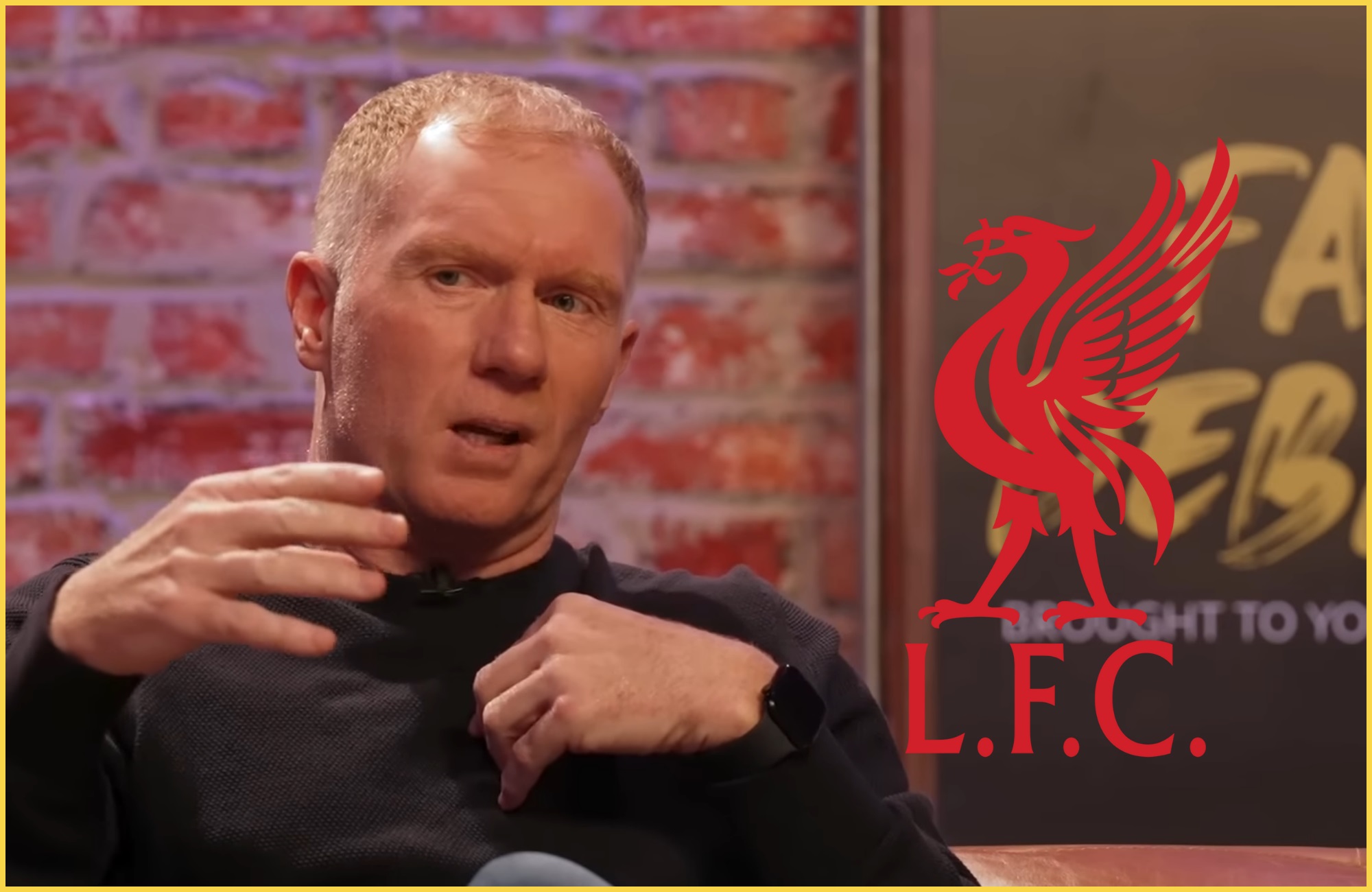 Paul Scholes gestures with his hands next to Liverpool club crest.