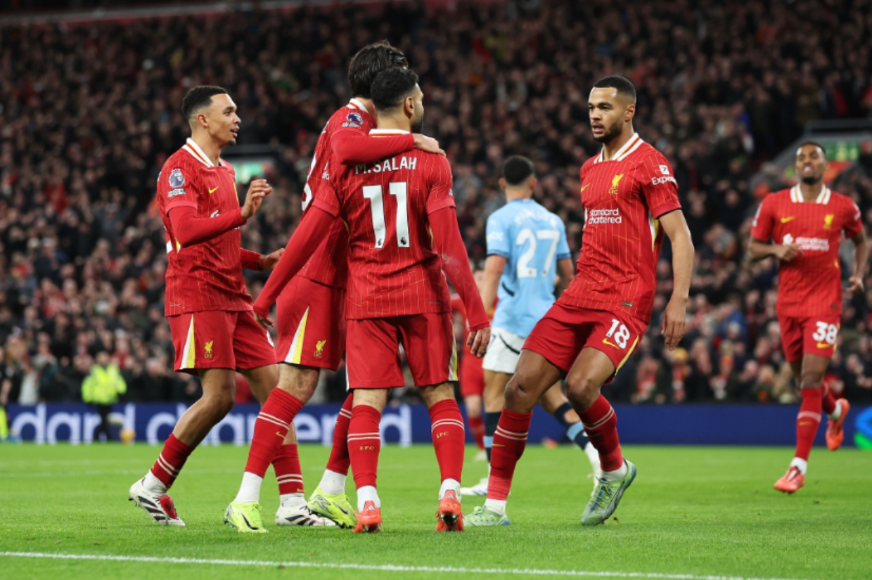 Paul Merson believes that four points from Liverpool's next two games would 'virtally' wrap up the Premier League title