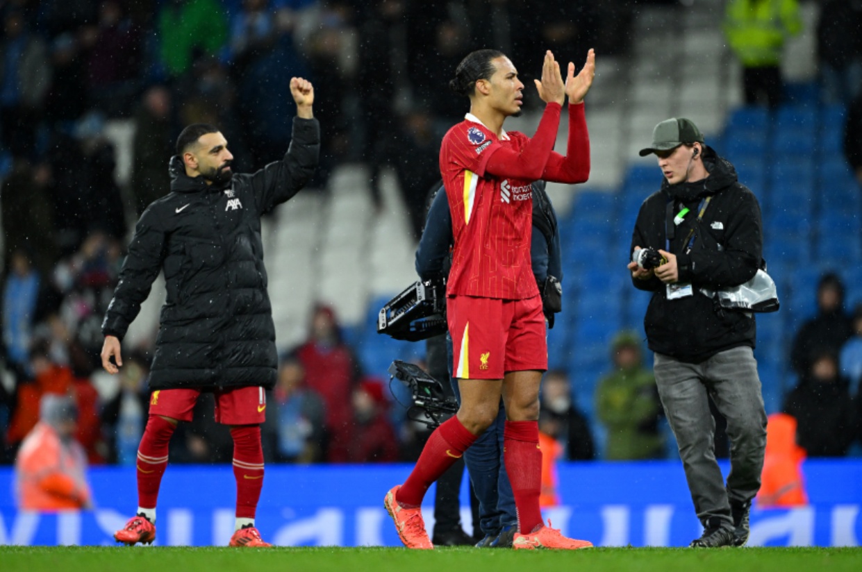 Mo Salah and Virgil van Dijk celebrate Liverpool's win over Man City