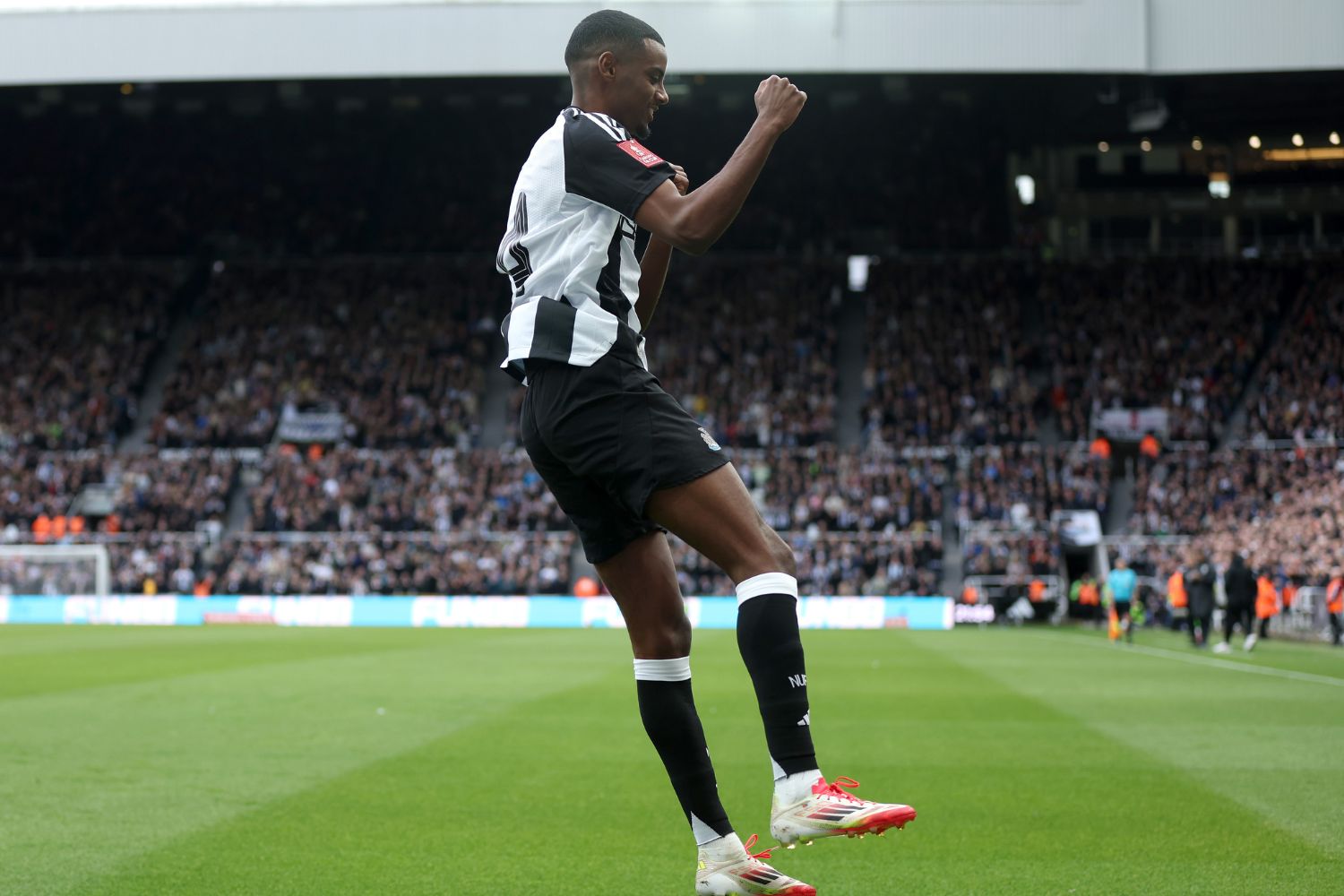 Alexander Isak celebrates scoring for Newcastle