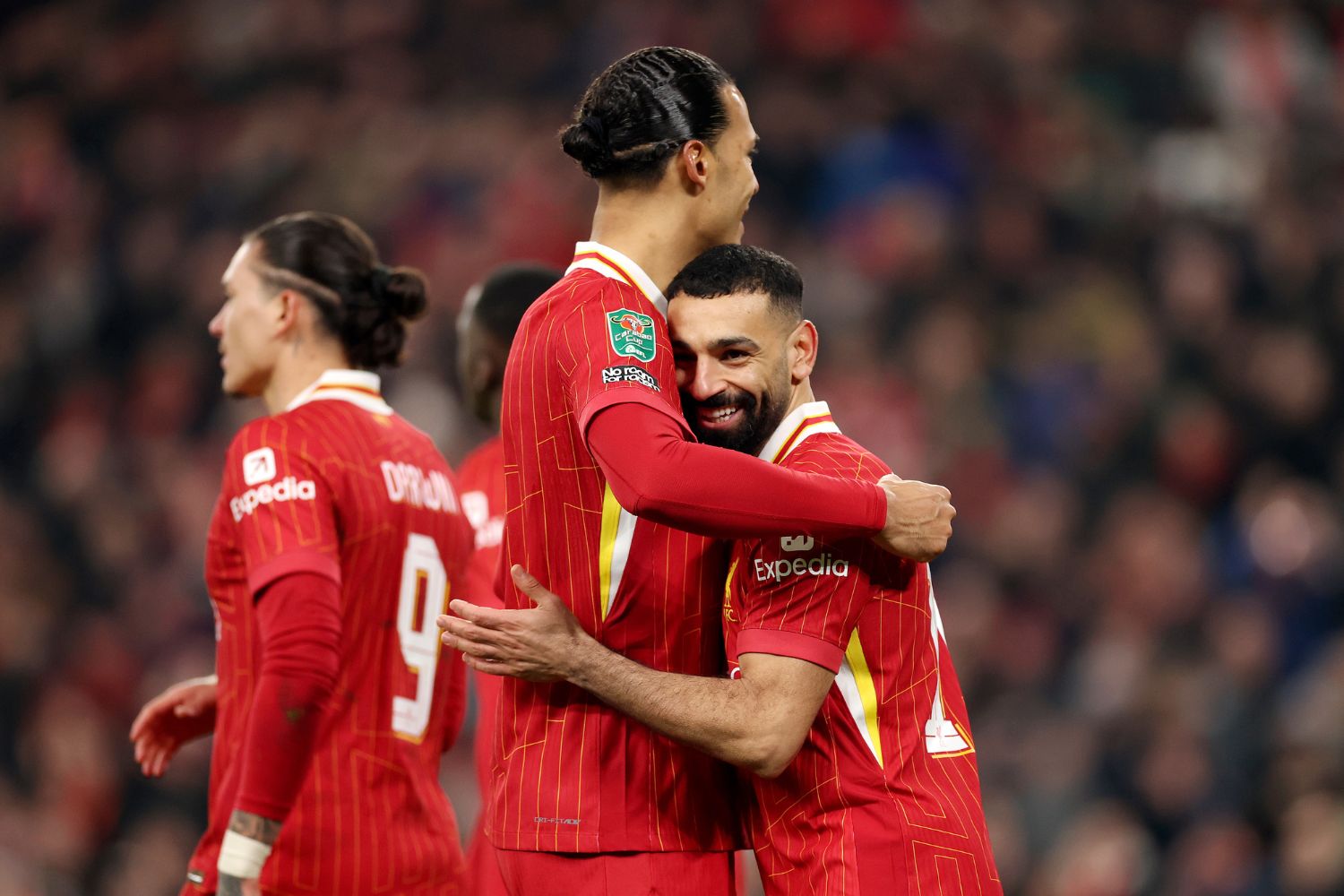 Mo Salah and Virgil van Dijk celebrate together at Anfield