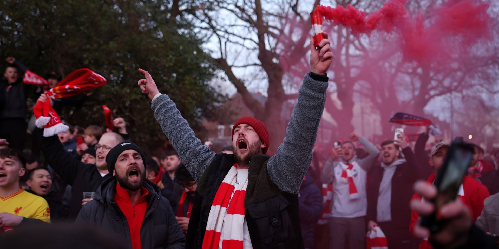 Liverpool fans sing before a game at Anfield