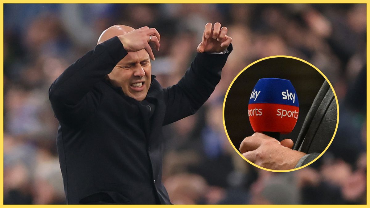 Arne Slot raises his hands in frustration next to Sky Sports microphone.