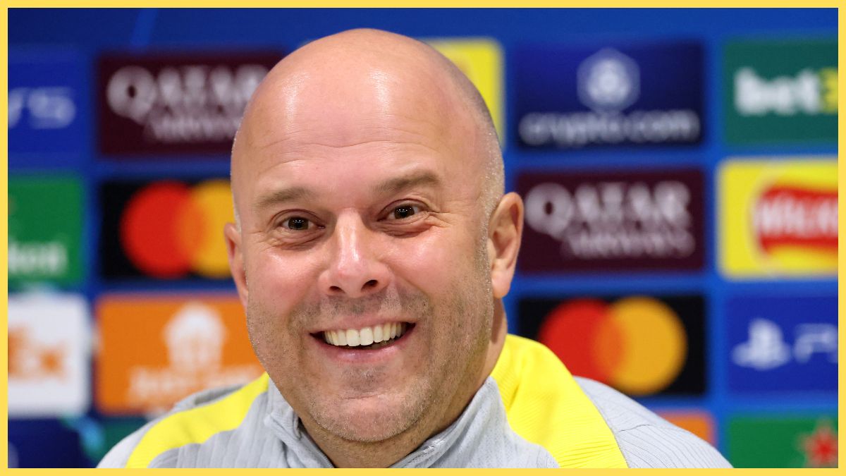 Arne Slot grins during Liverpool press conference.