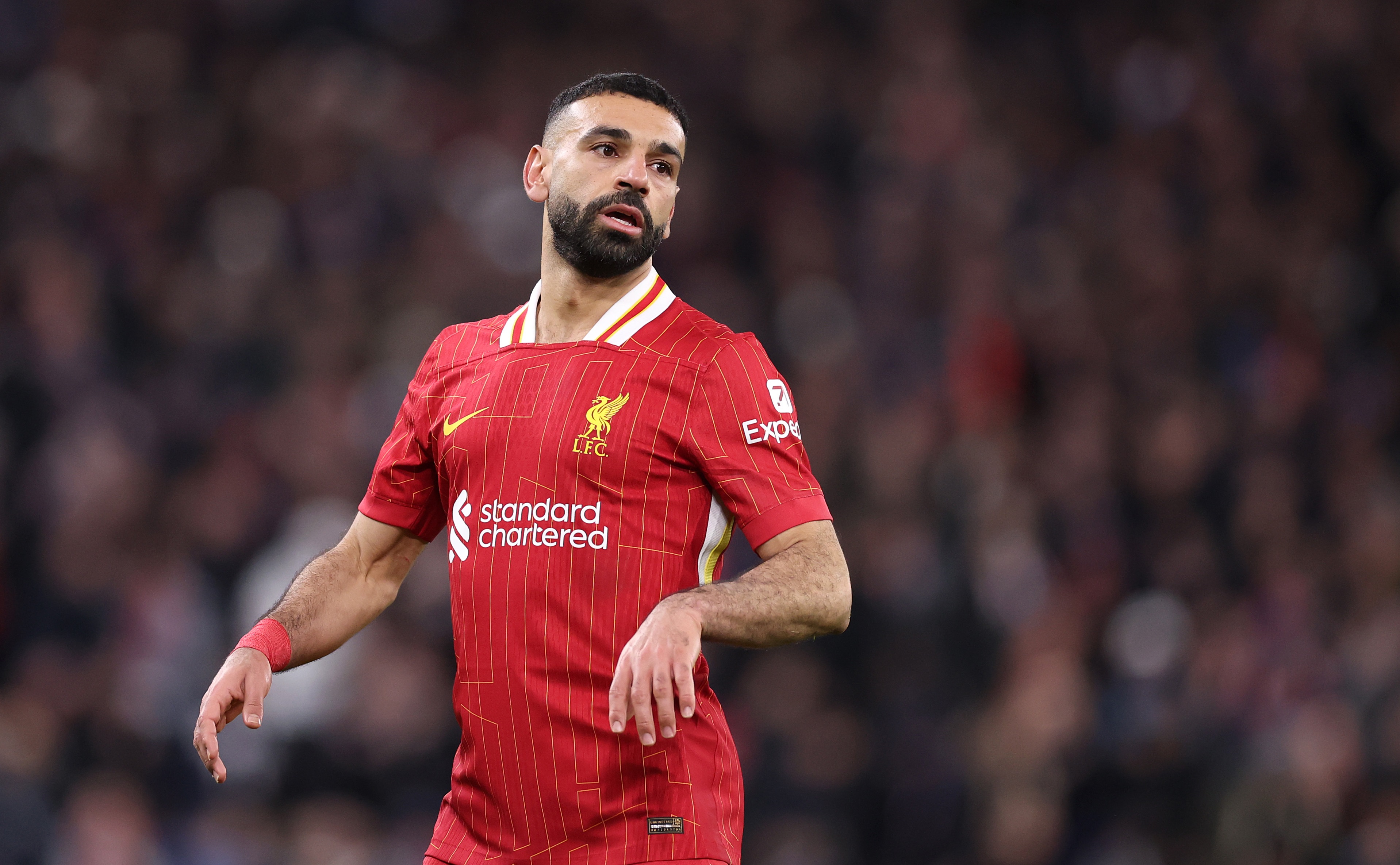 Mo Salah looks over his shoulder at Anfield.