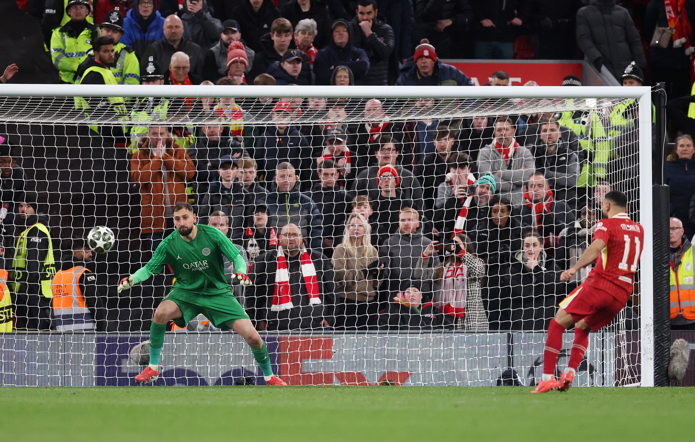 Mo Salah scores his penalty against Gianluigi Donnarumma.