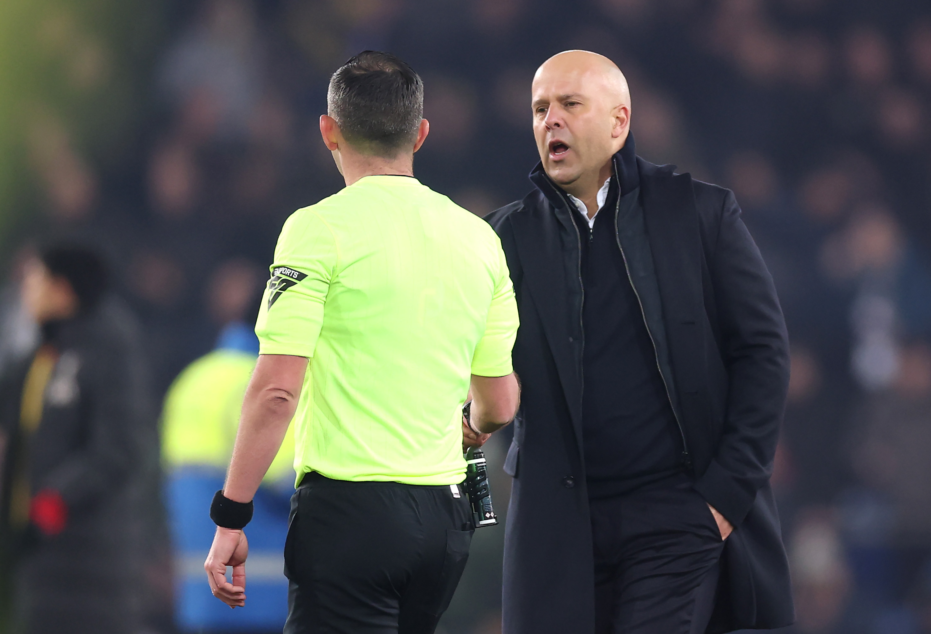 Arne Slot was fined £70,000 and banned from the touchline for two games after confronting Michael Oliver
