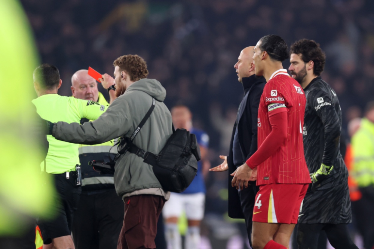 Michael Oliver showed a red card to Arne Slot after the Merseyside derby