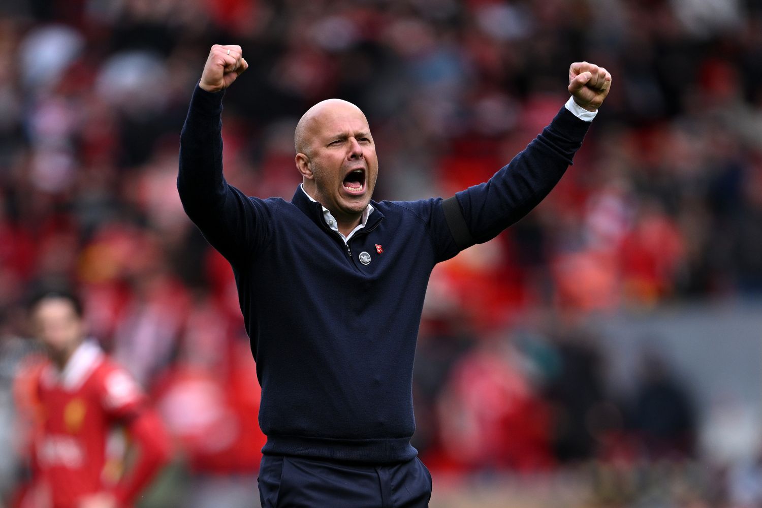 Arne Slot celebrates a win at Anfield