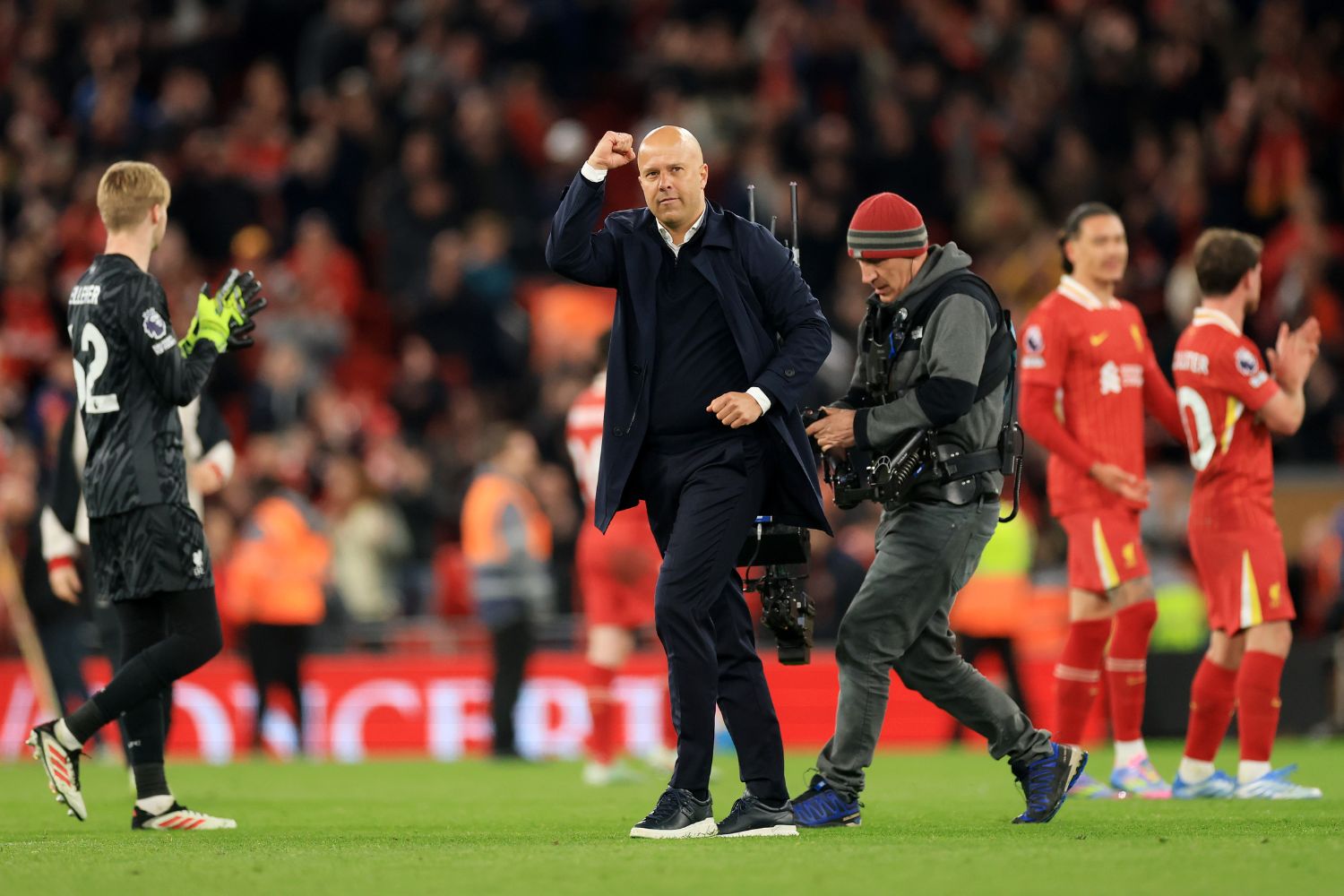 Arne Slot celebrates victory at Anfield against Everton