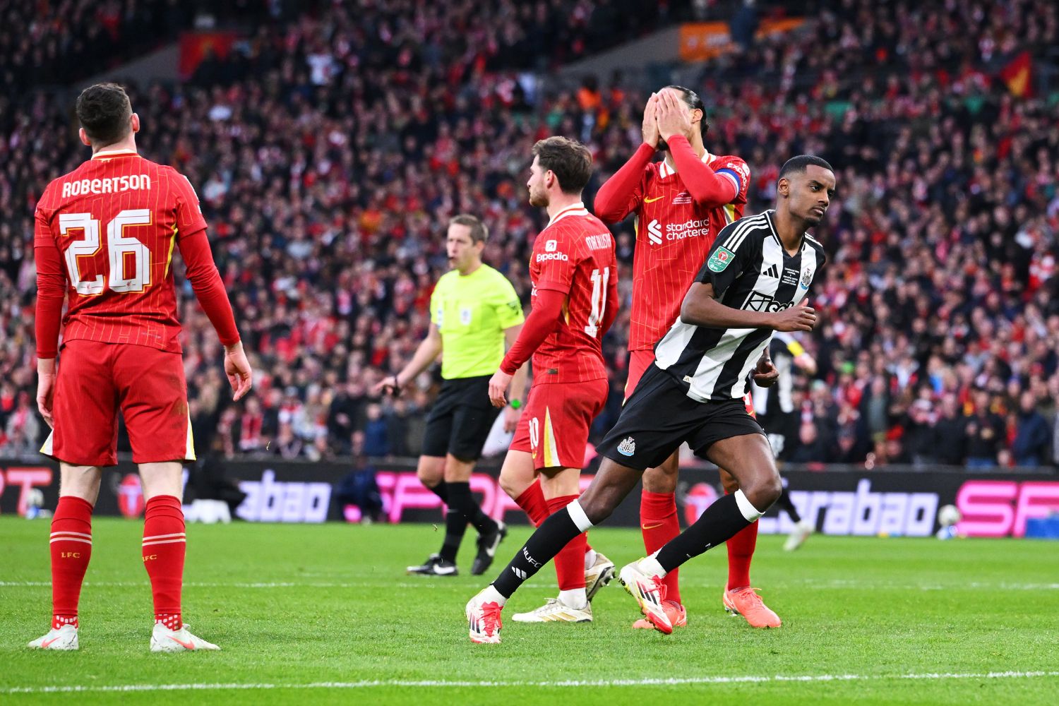 Van Dijk watches as Newcastle celebrate scoring
