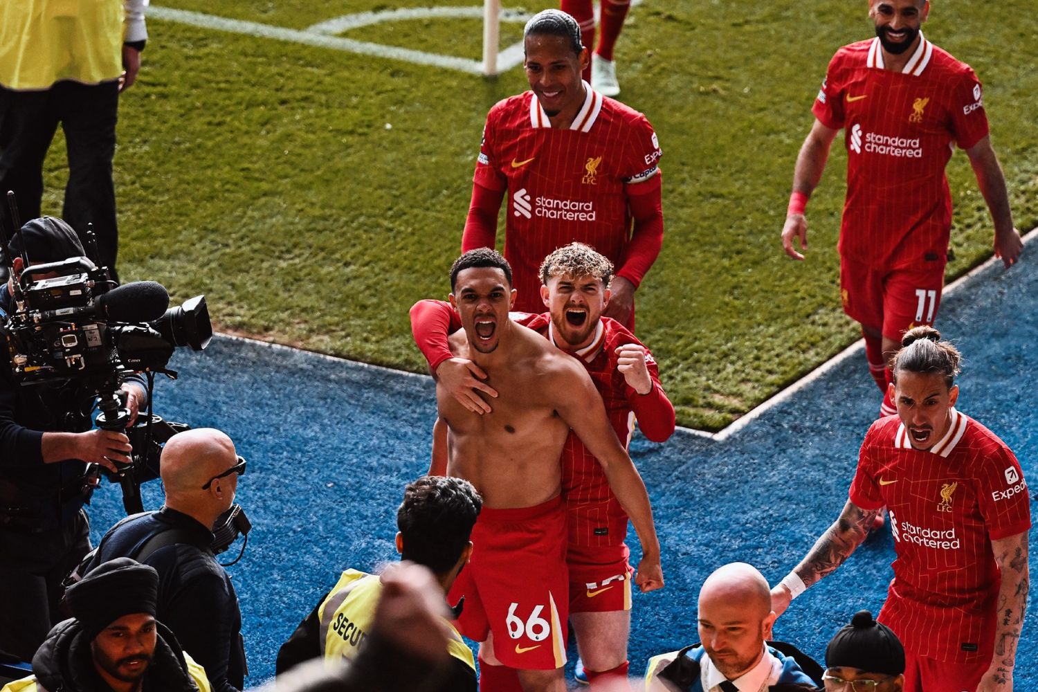 Virgil van Dijk and Mo Salah celebrate scoring against Leicester