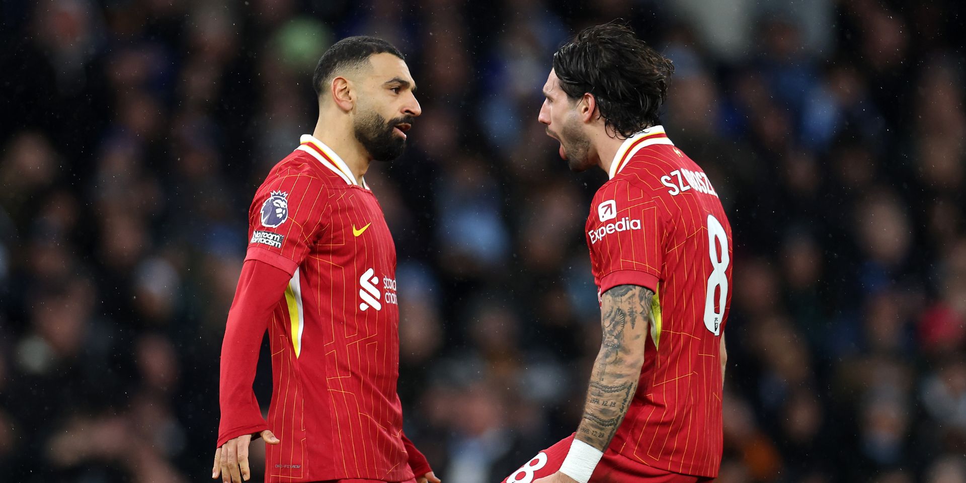 Salah and Szoboszlai celebrate for Liverpool