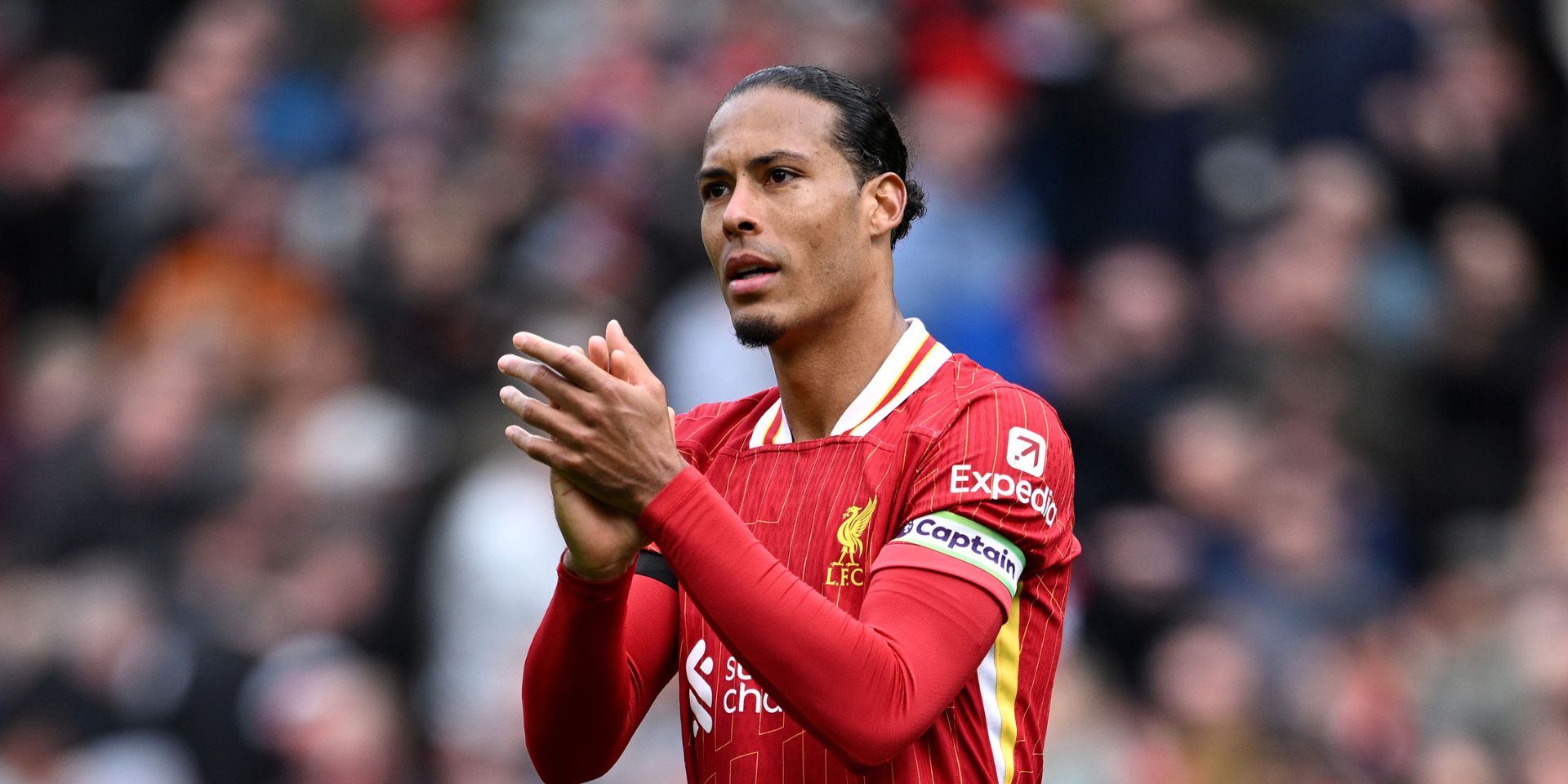 Virgil van Dijk as captain, clapping Liverpool fans