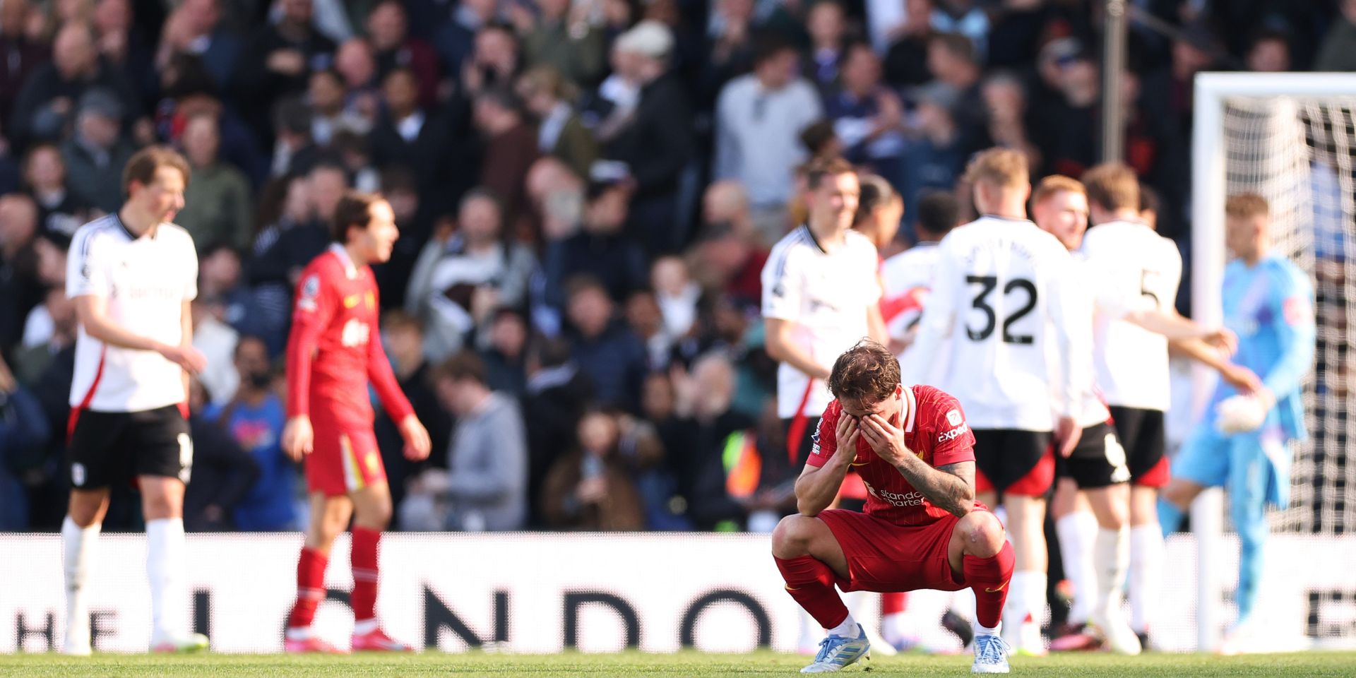 Liverpool players are dejected after losing to Fulham