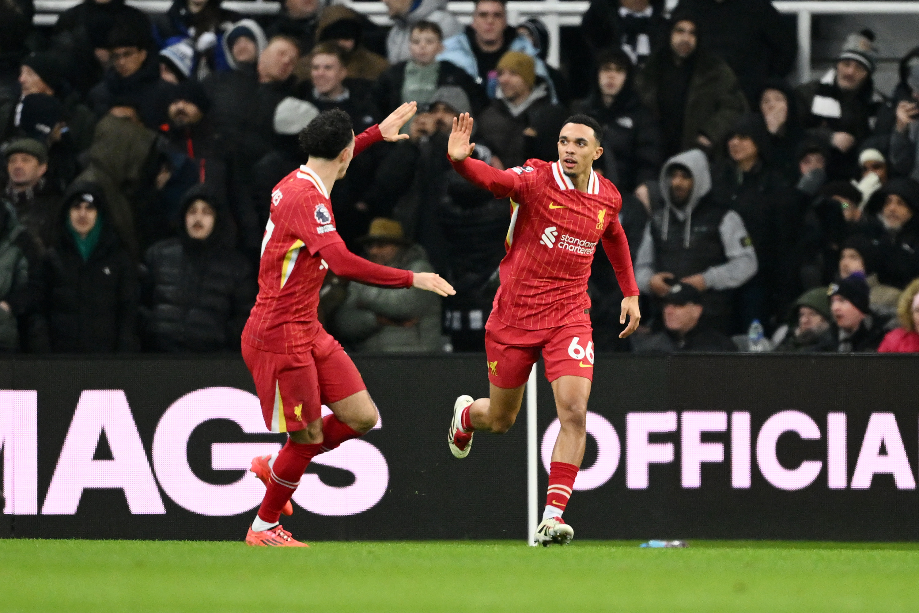 Curtis Jones was seen celebrating with Trent Alexander-Arnold after Liverpool's derby win