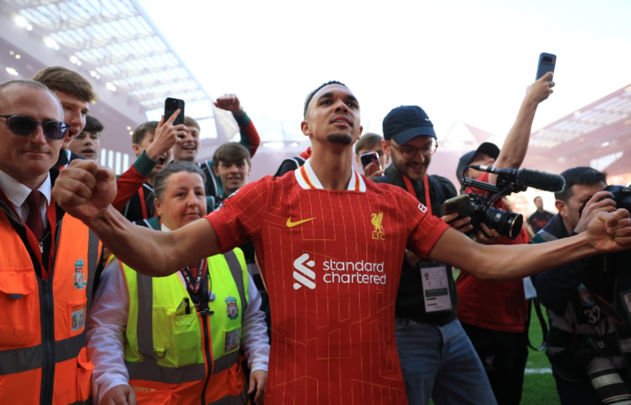 Trent Alexander-Arnold spoke with Liverpool owner John W Henry on the pitch at Anfield on Sunday