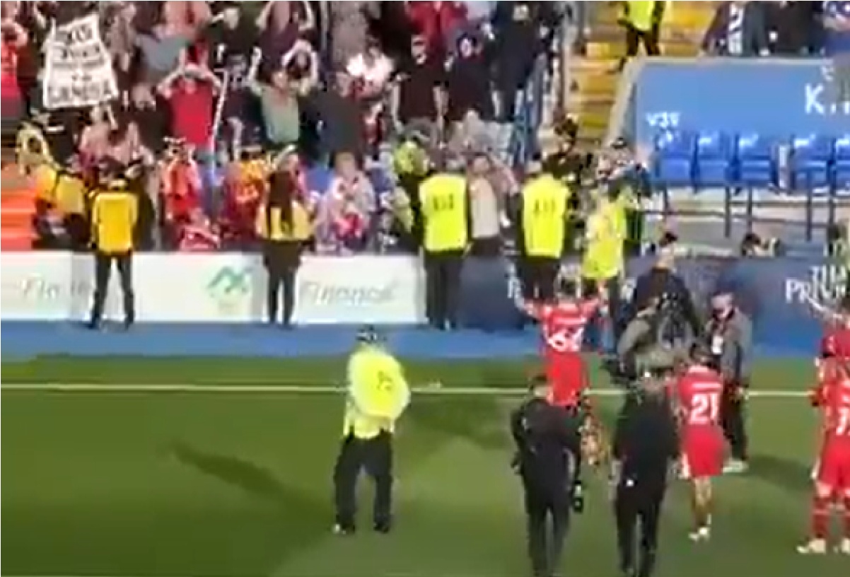 Trent Alexander-Arnold celebrates with Liverpool fans after his late winner against Leicester