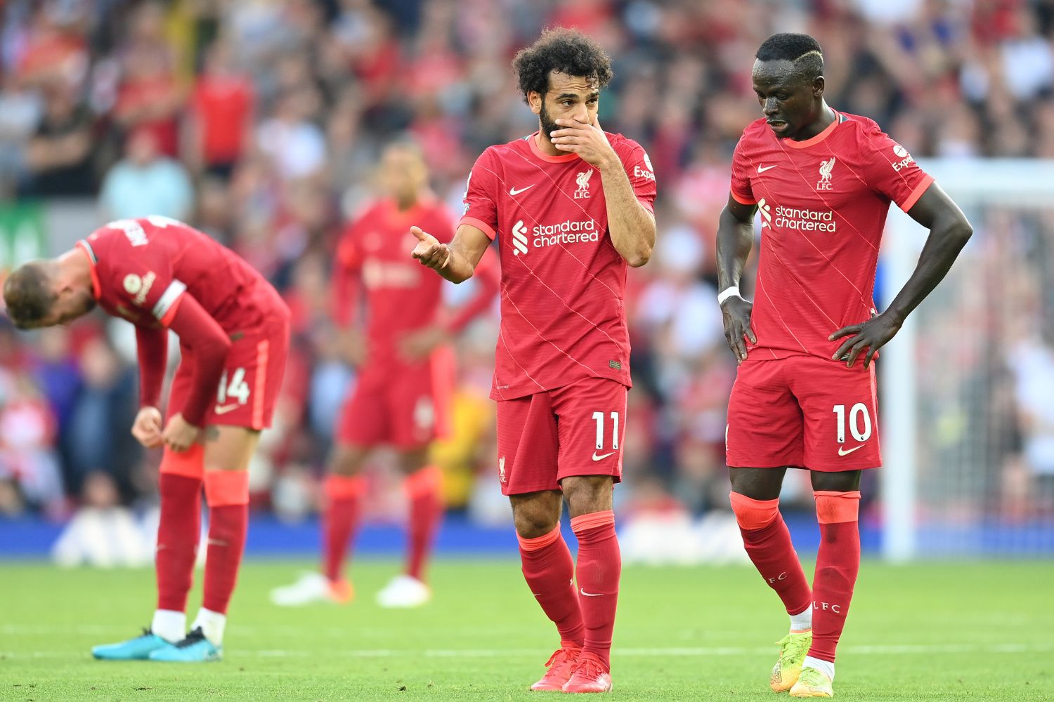 Sadio Mane and Mo Salah in action for Liverpool