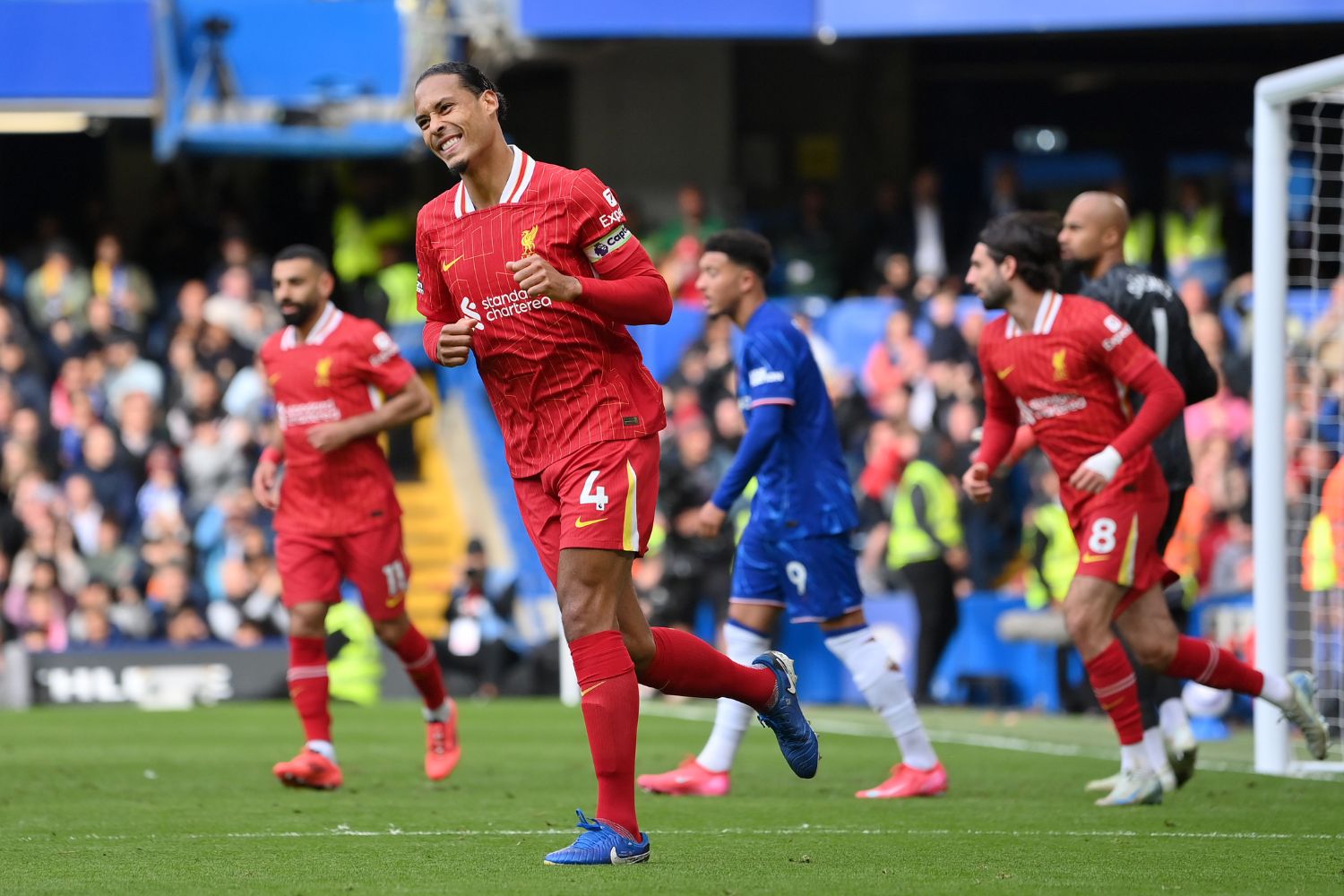 Virgil van Dijk celebrates scoring for Liverpool against Chelsea