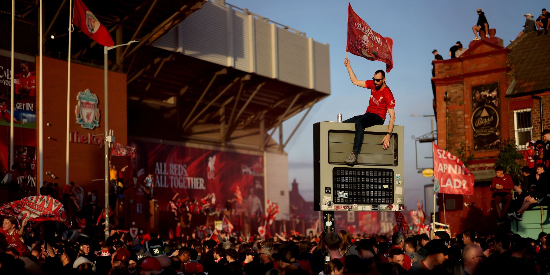Liverpool fans celebrate winning the league