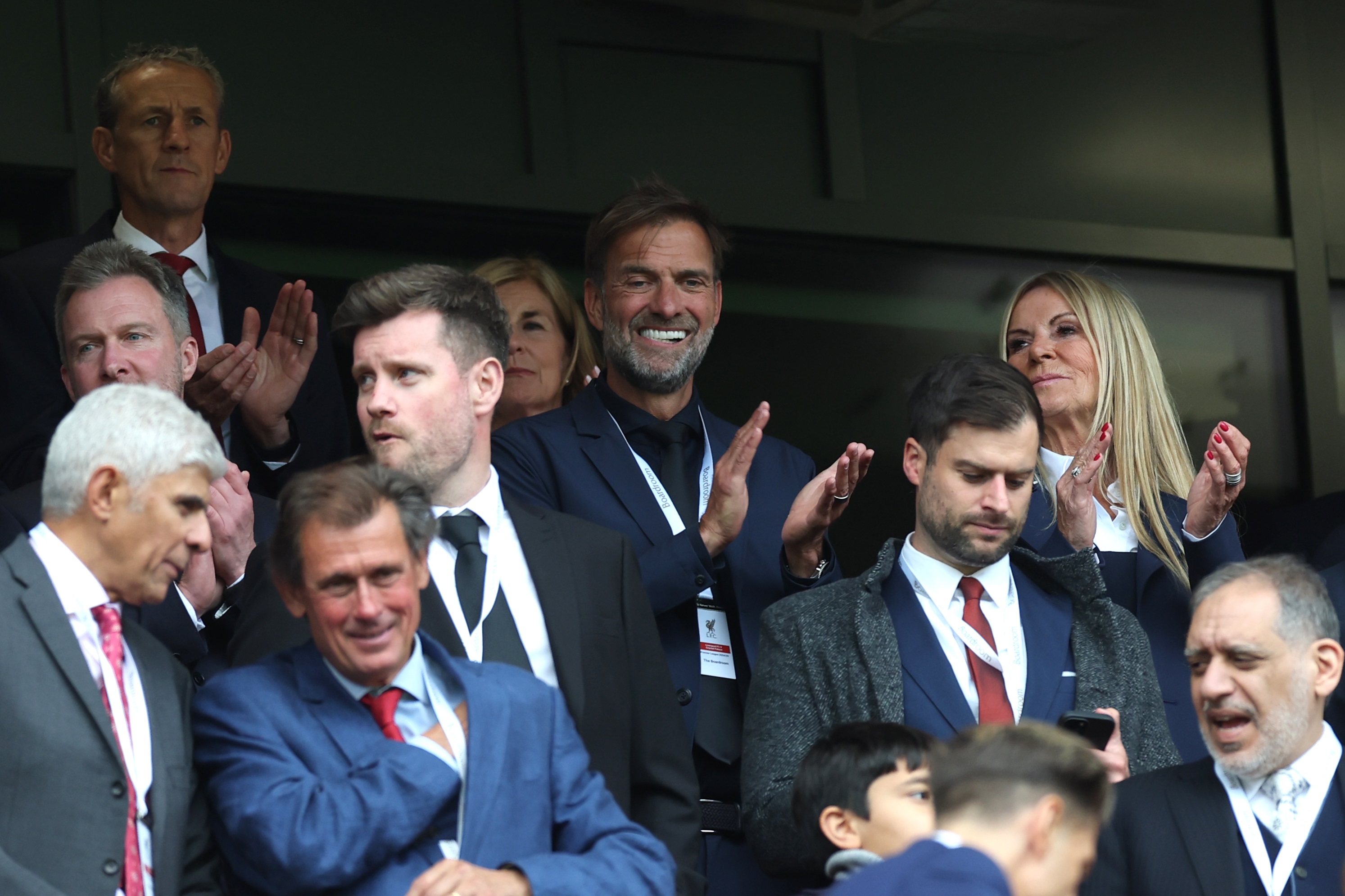Jurgen Klopp claps in the stands at Anfield.