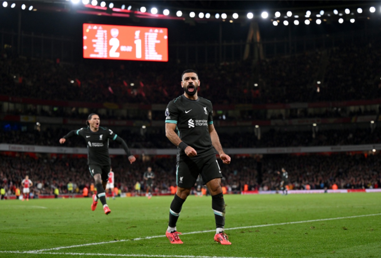 Mo Salah celebrates scoring Liverpool's late equaliser at Arsenal in October 2024