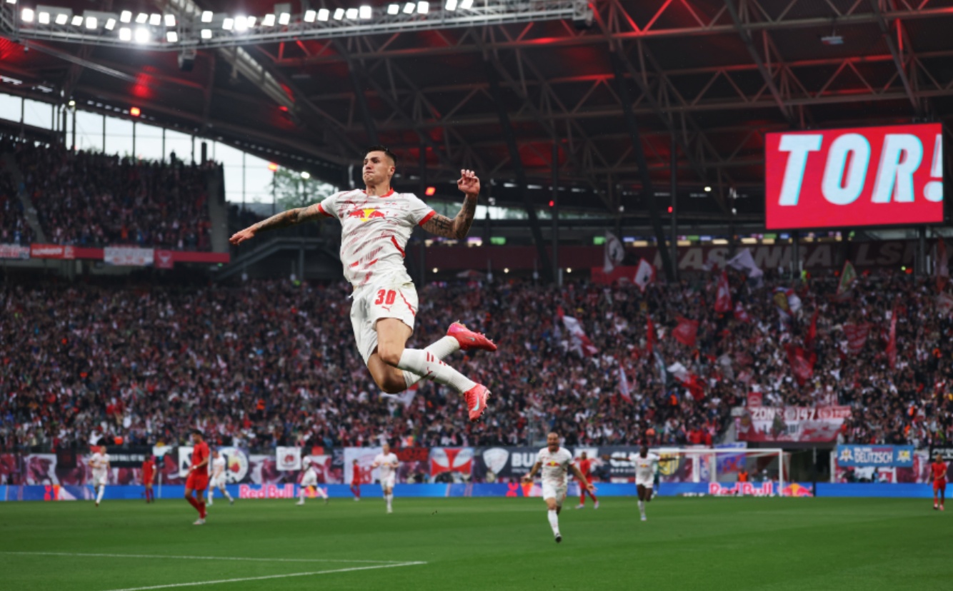 Benjamin Sesko celebrates scoring in RB Leipzig's 3-3 draw against Bayern Munich