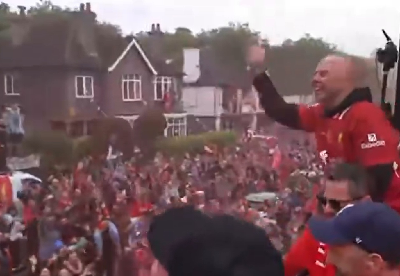 Arne Slot revs up the crowd during Liverpool's victory parade