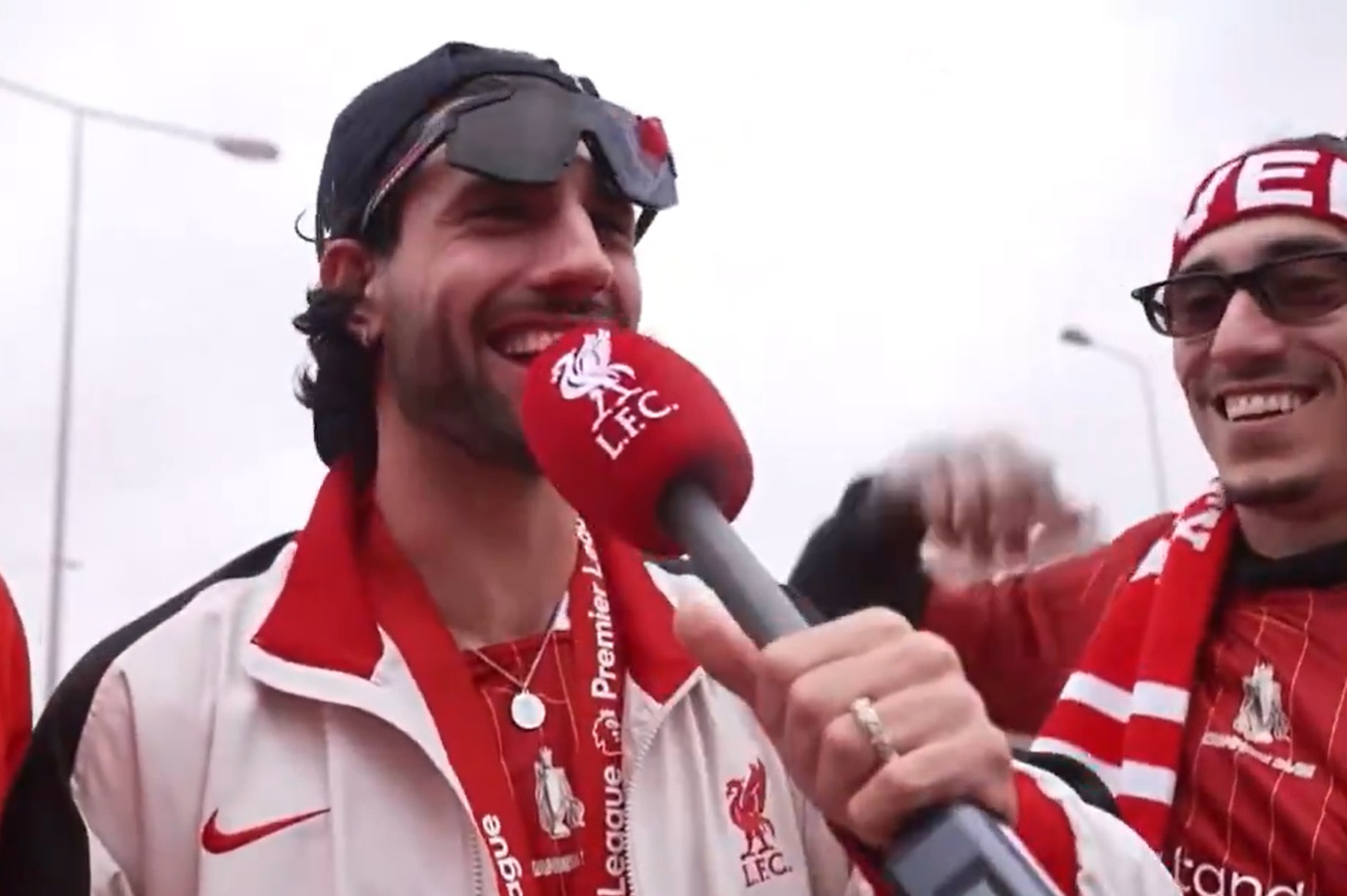 Dominik Szoboszlai is interviewed by Kostas Tsimikas during Liverpool's victory parade
