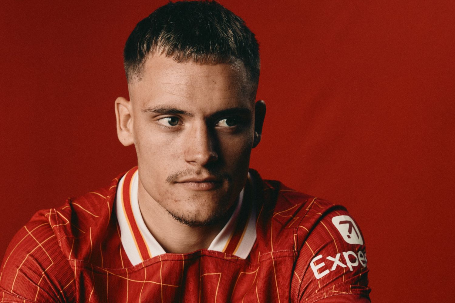 Florian Wirtz poses as a Liverpool player