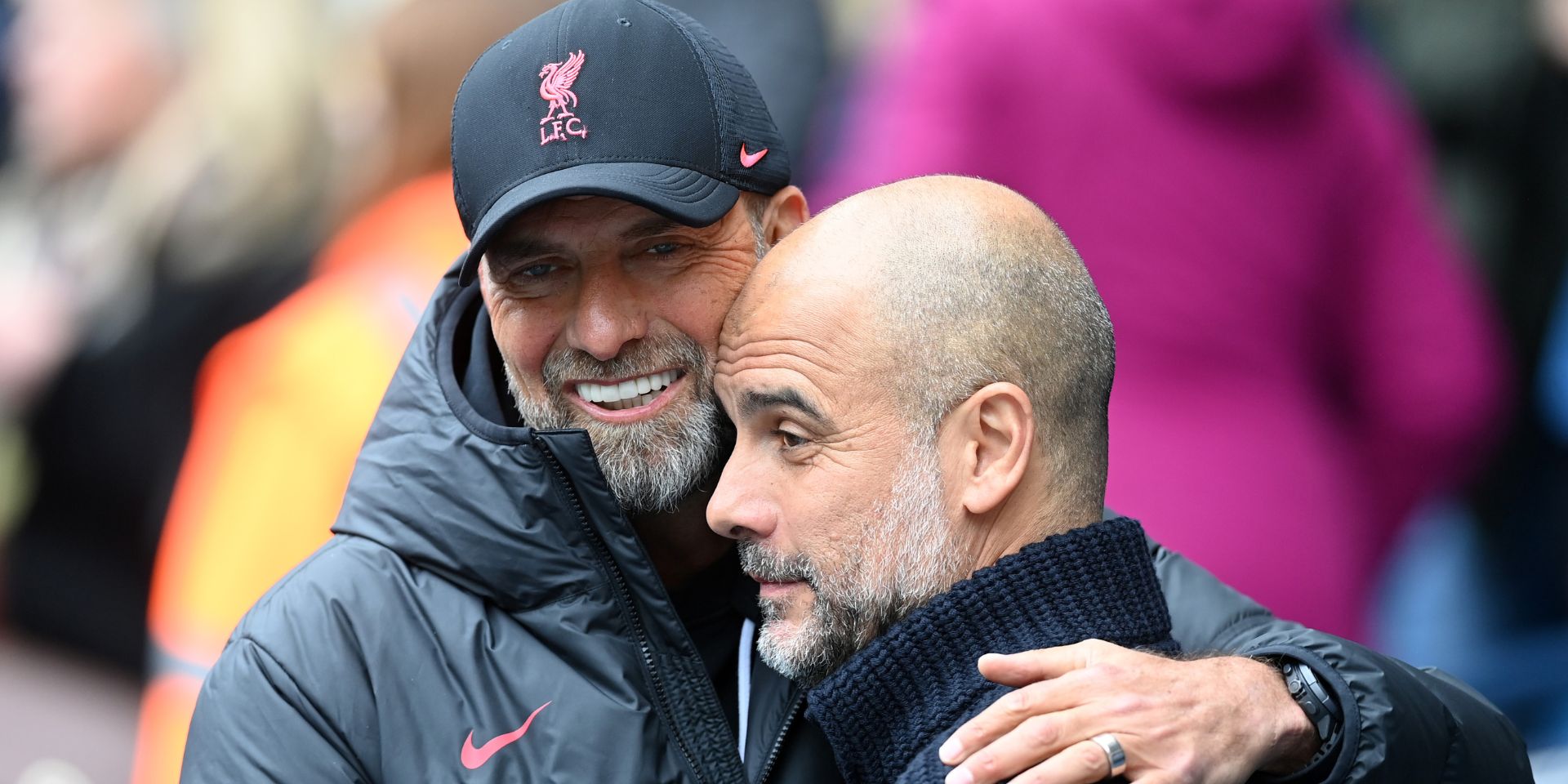 Pep Guardiola and Jurgen Klopp embrace