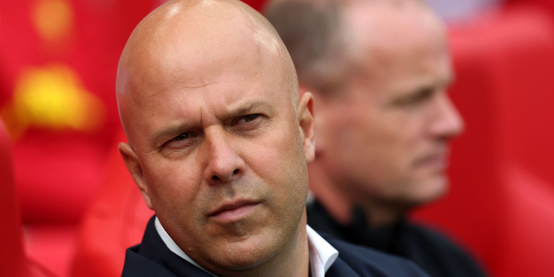 Arne Slot watches Liverpool from the bench